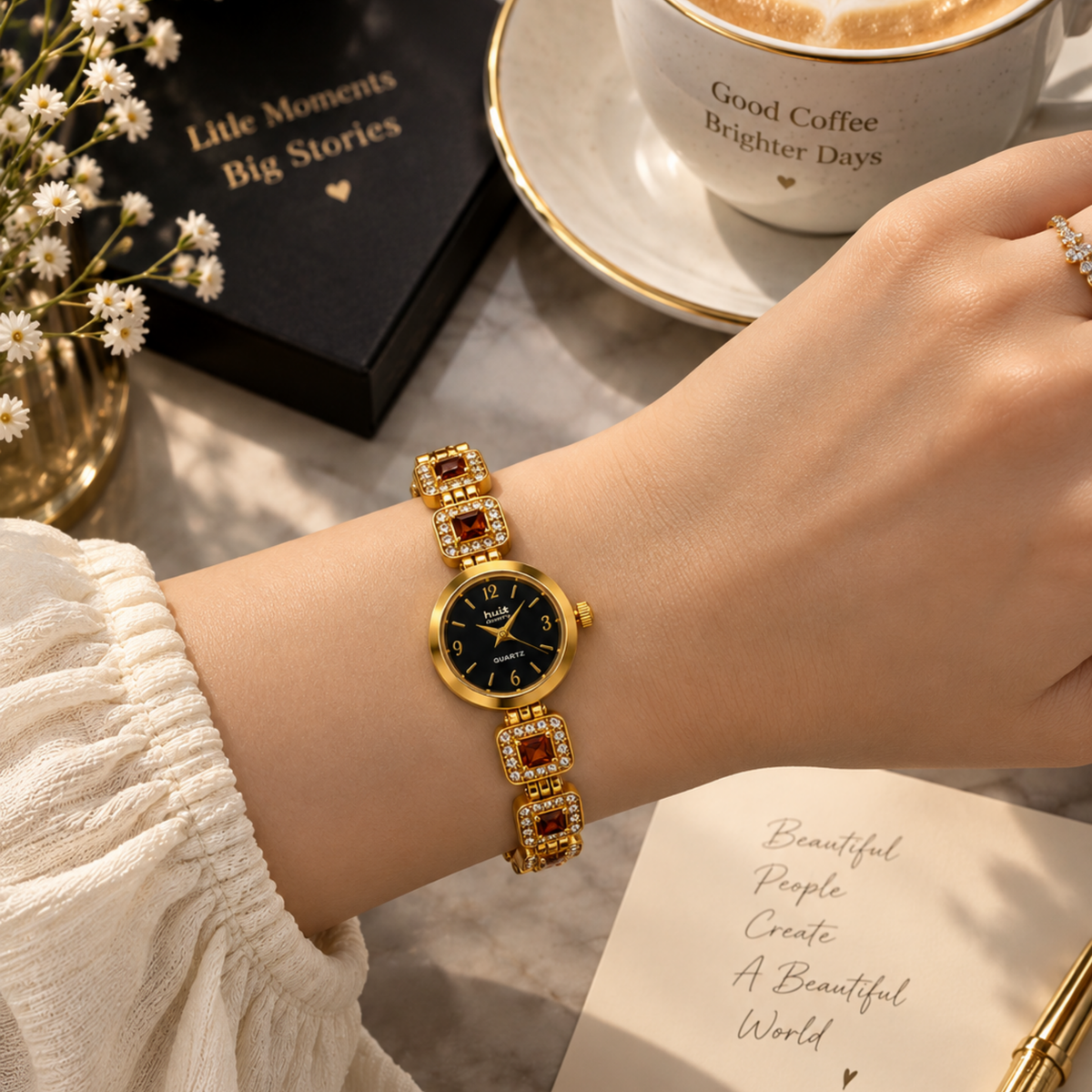Close up of gold garnet crystal bracelet watch on wrist