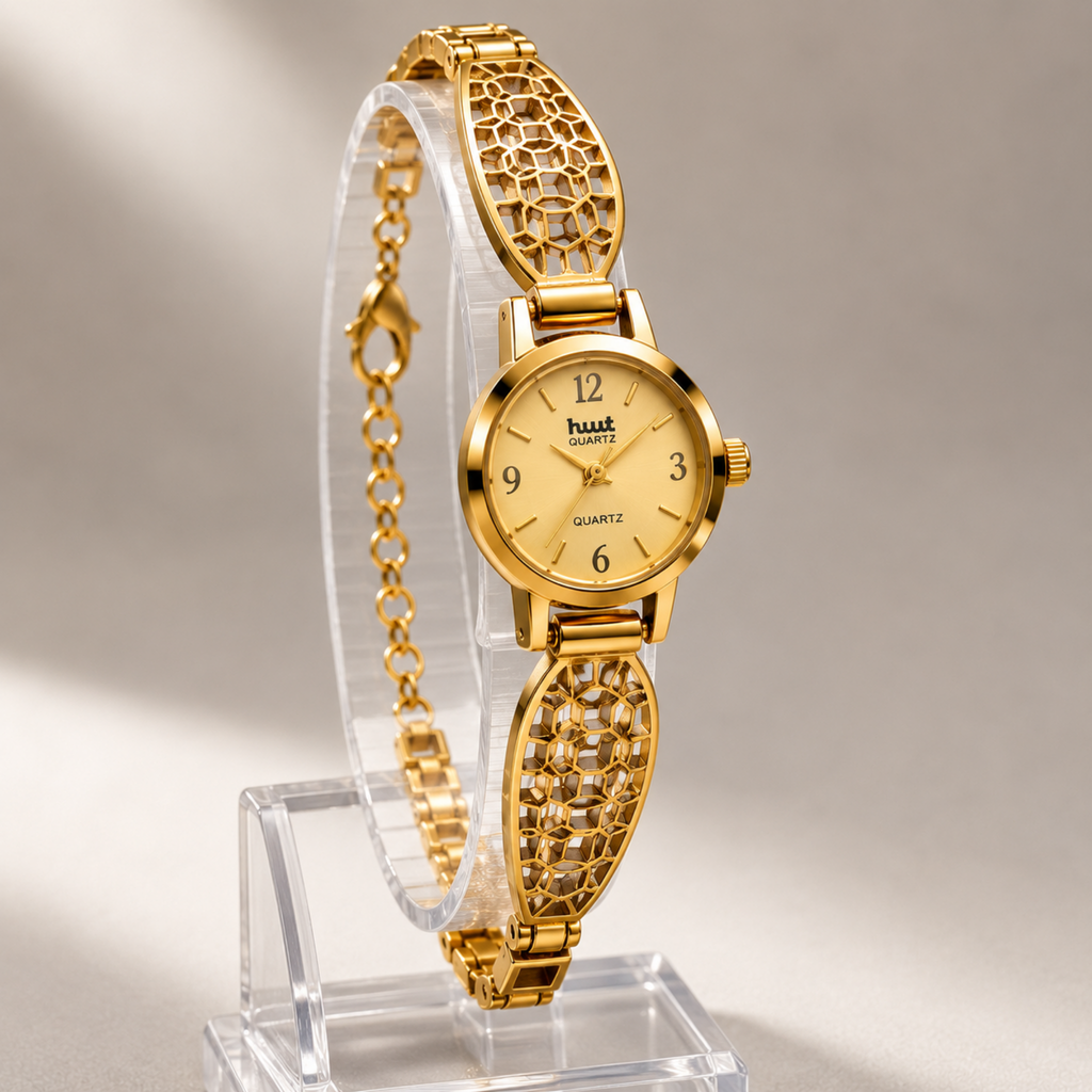 Close up of gold geometric mosaic bracelet watch on display stand