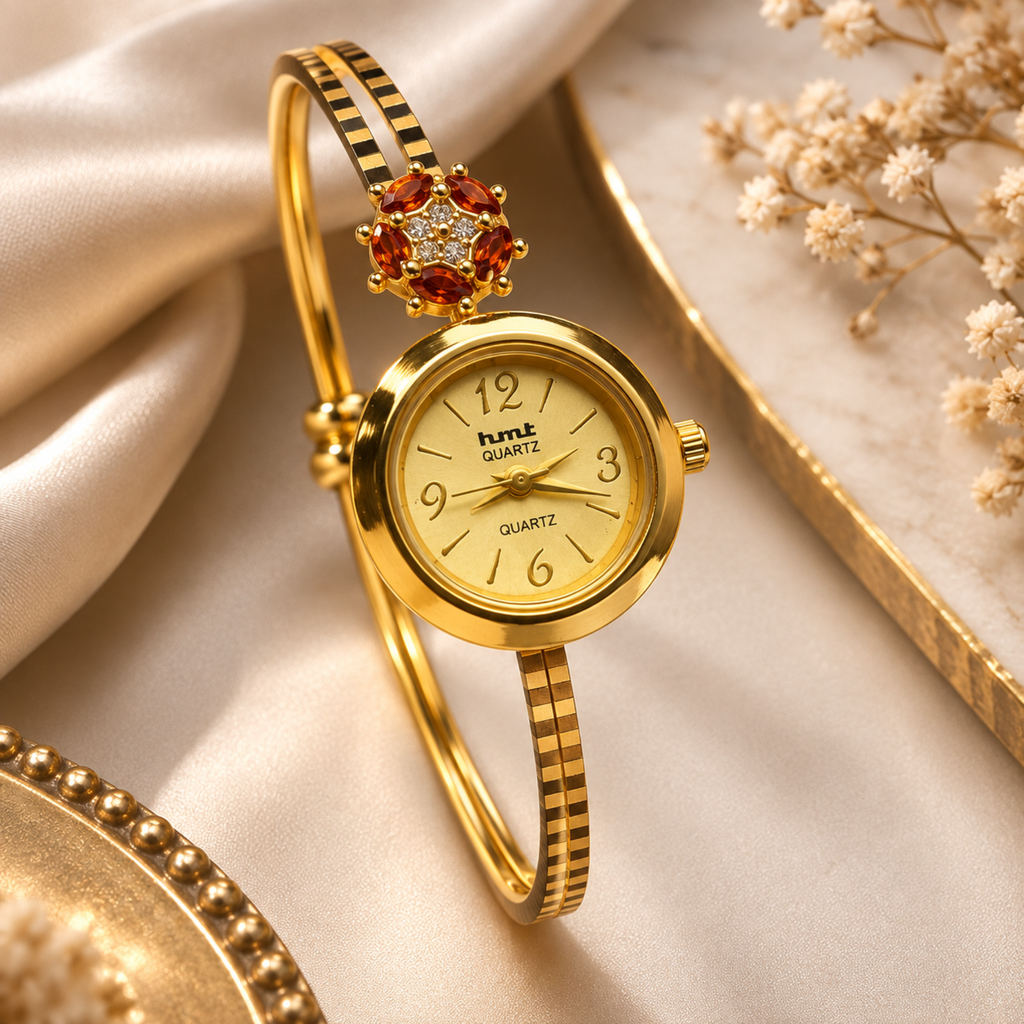Gold plated garnet flower bangle watch for women - flat lay