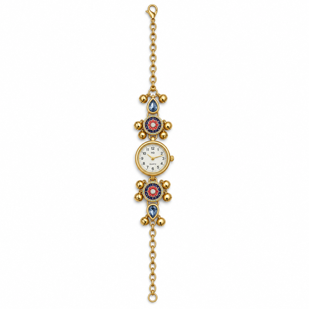 A vintage gold-tone bracelet watch with a central round dial, decorative floral motifs, and blue teardrop-shaped accents on a plain white background.