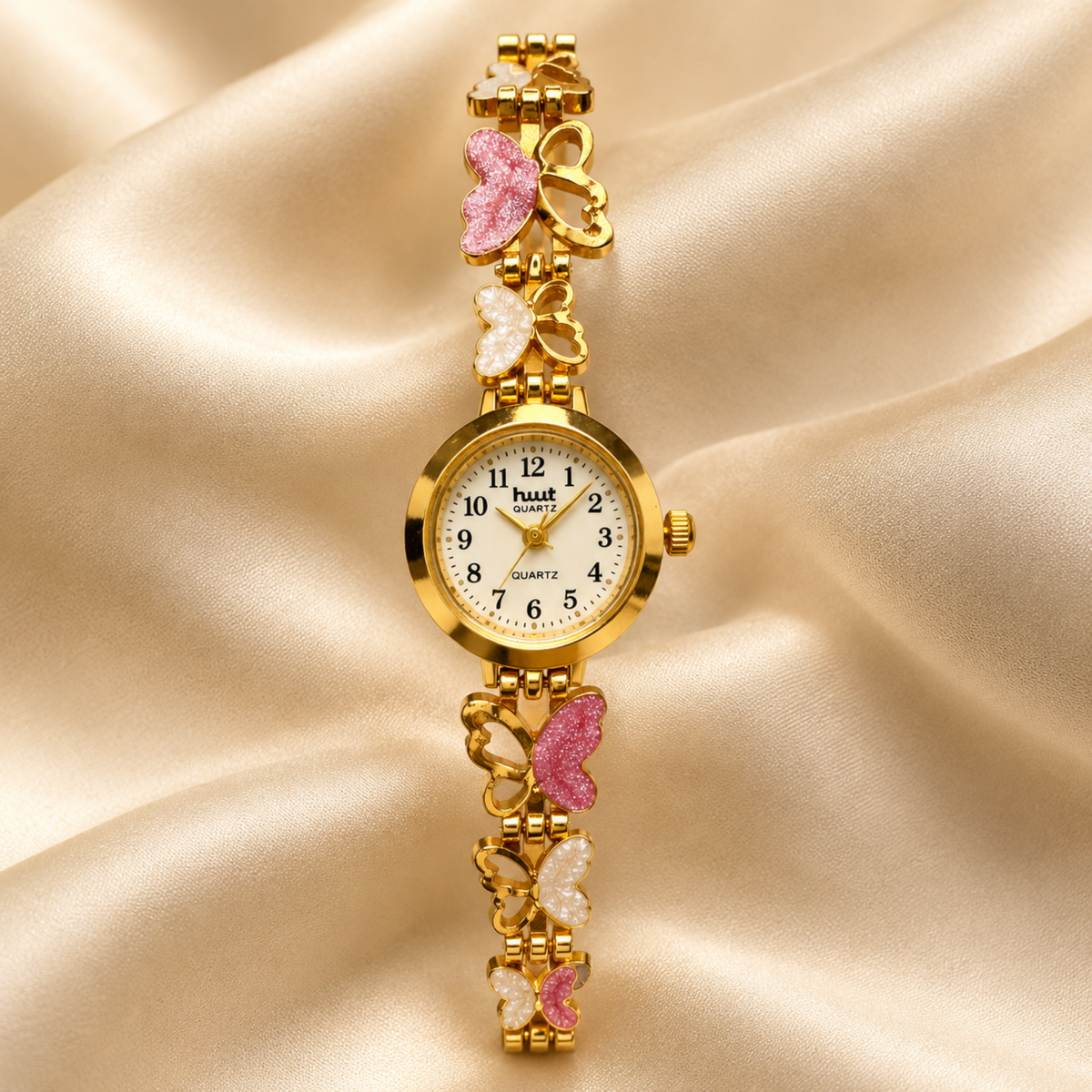 Lobster clasp and extension chain detail on butterfly charm watch