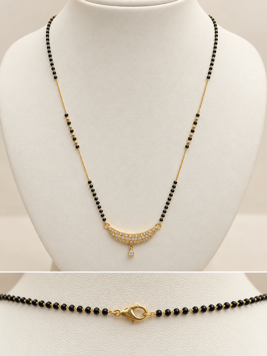A black and gold beaded necklace displayed on a white jewelry bust, with a close-up inset at the bottom showing the clasp detail.