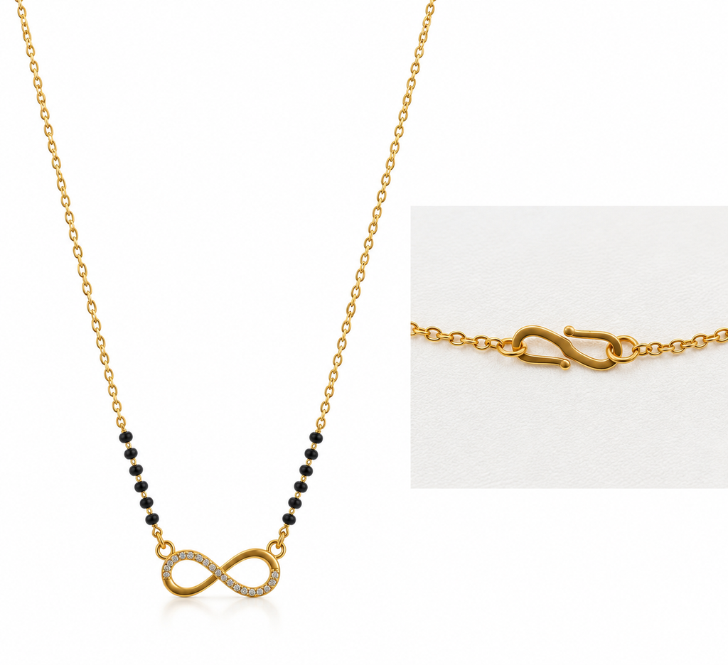 Gold infinity necklace with a row of small black beads on one side and a pavé-set clear stone infinity symbol on the other, shown on a white background with a close-up inset of the clasp.