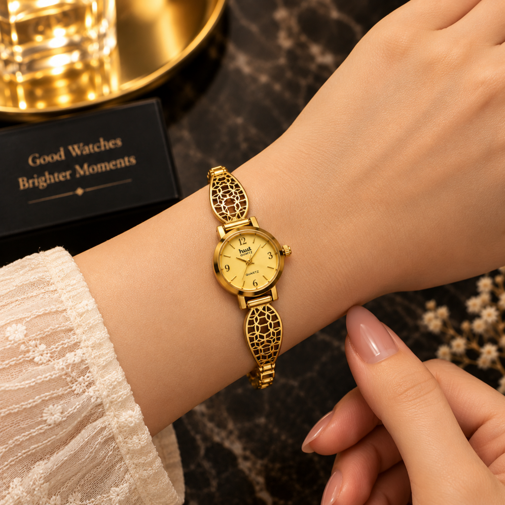 Woman wearing gold plated geometric mosaic bracelet watch on wrist