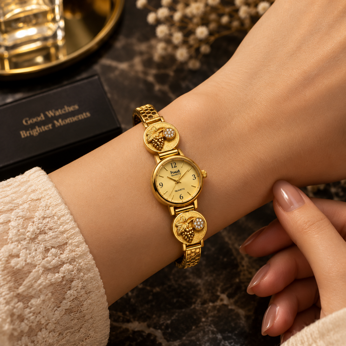 Woman wearing gold plated grapevine bracelet watch for daily wear